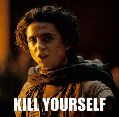 A Man With A Scarf Around His Neck And The Words " Kill Yourself " On The Bottom GIF