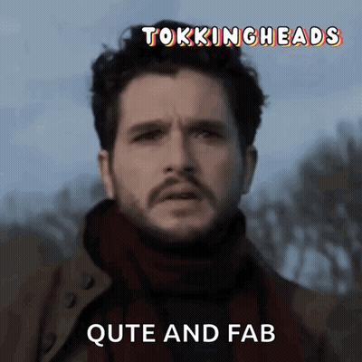 A Man With A Scarf Around His Neck And The Words Quite And Fab GIF