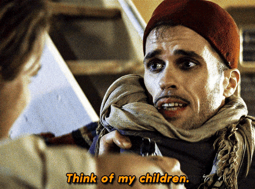 A Man With A Scarf Around His Neck Is Talking To Another Man With The Words Think Of My Children Written Below Him GIF