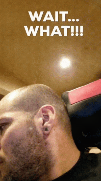 A Man With A Shaved Head And The Words Wait What GIF