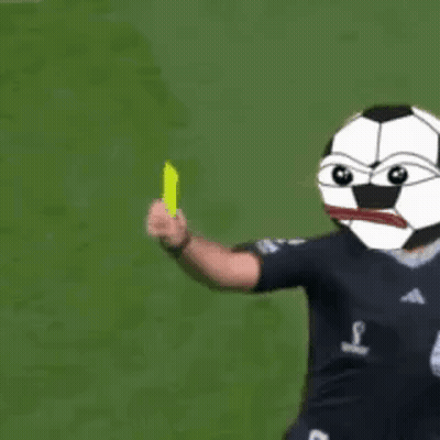 A Man With A Soccer Ball Head Is Holding A Yellow Card . GIF