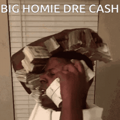 A Man With A Stack Of Money On His Head Is Talking On A Phone . GIF
