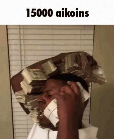 A Man With A Stack Of Money On His Head Talking On A Cell Phone . GIF