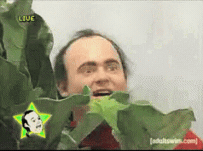 A Man With A Star On His Head And The Word Live On The Bottom GIF