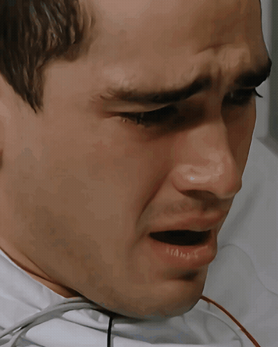 A Man With A Stethoscope Around His Neck Is Crying GIF