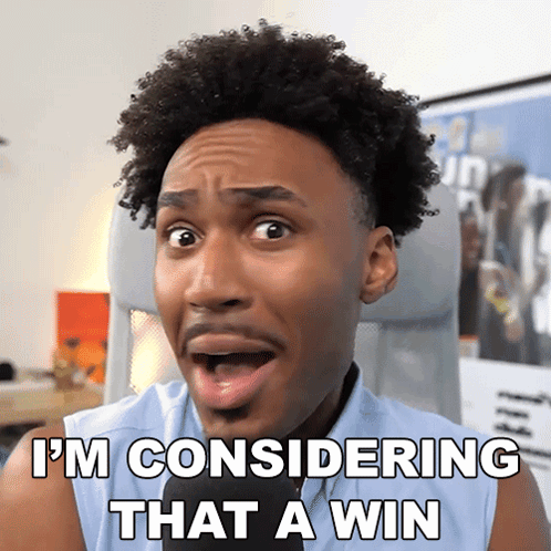 A Man With A Surprised Look On His Face And The Words I 'M Considering That A Win GIF