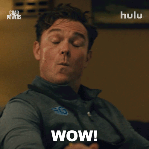 A Man With A Surprised Look On His Face And The Words Wow On The Bottom GIF