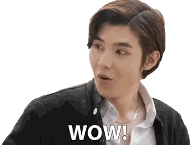 A Man With A Surprised Look On His Face Has The Word Wow Written On His Chest Sticker