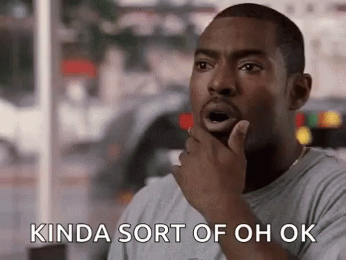 A Man With A Surprised Look On His Face Is Holding His Hand To His Chin And Says Kinda Sort Of Oh Ok GIF