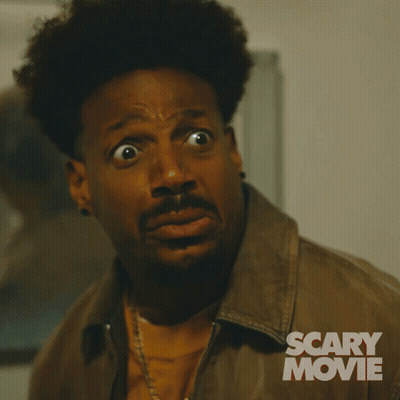 a man with a surprised look on his face is in a scary movie advertisement