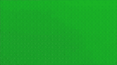 a man with a surprised look on his face is on a green screen .
