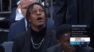 A Man With A Surprised Look On His Face Is Watching A Basketball Game Between Indiana And Okc GIF