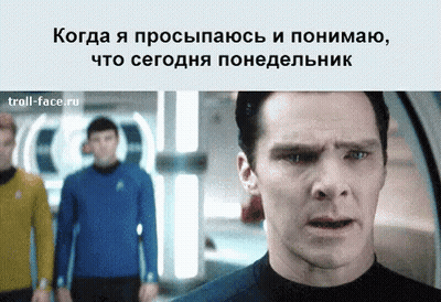 A Man With A Surprised Look On His Face Stands In Front Of A Group Of People GIF