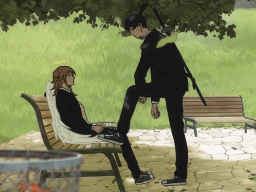 A Man With A Sword Standing Next To A Woman On A Bench GIF