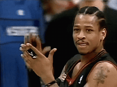 A Man With A Tattoo On His Arm Is Clapping GIF