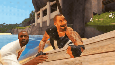 A Man With A Tattoo On His Arm Is Crawling On A Wooden Surface GIF