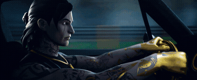 A Man With A Tattoo On His Arm Is Driving A Car At Night GIF