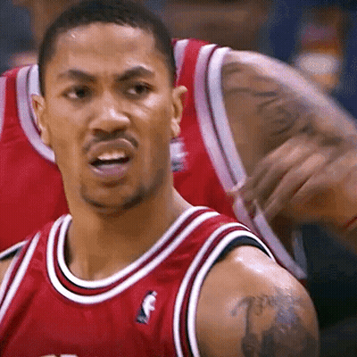 A Man With A Tattoo On His Arm Is Wearing A Red Jersey With The Letter F On The Front GIF