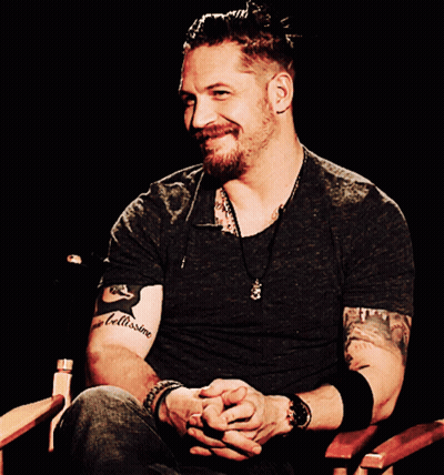 A Man With A Tattoo On His Arm That Says " Bellissime " GIF