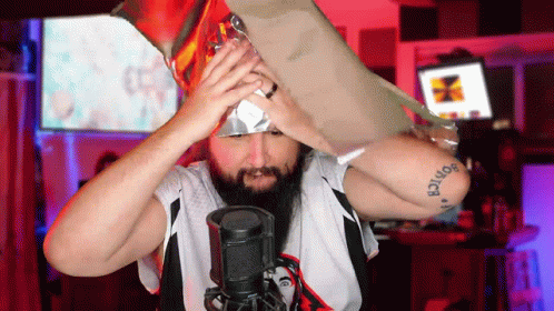 A Man With A Tattoo On His Arm That Says ' Botice ' GIF