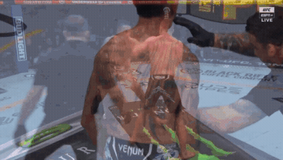 A Man With A Tattoo On His Back That Says Vemun GIF