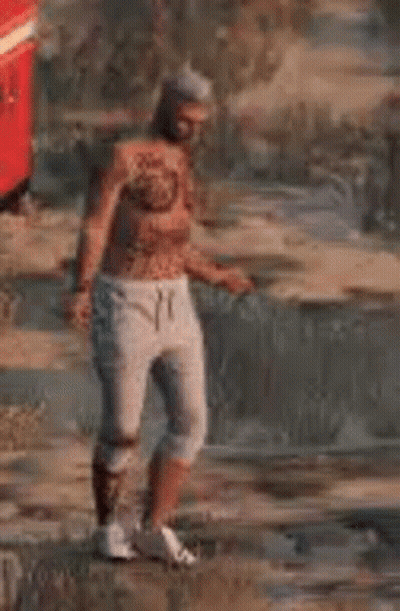 A Man With A Tattoo On His Chest Is Dancing In A Video Game In A Field . GIF