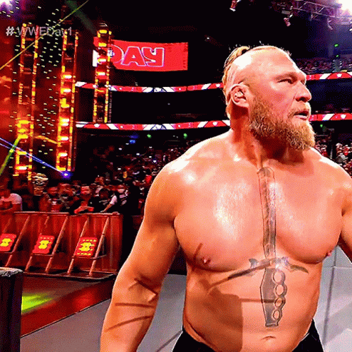 A Man With A Tattoo On His Chest Is Standing In Front Of A Sign That Says " Day " GIF