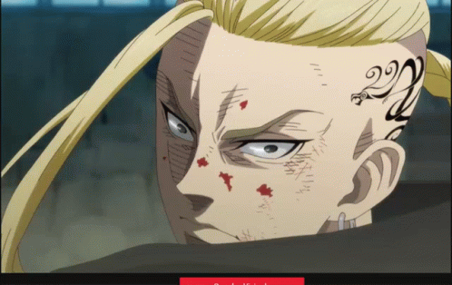 A Man With A Tattoo On His Face Has The Number 22 On His Forehead GIF