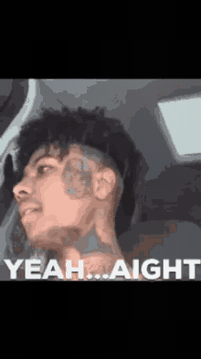 A Man With A Tattoo On His Face Is Sitting In A Car And Says Yeah ... Aight GIF