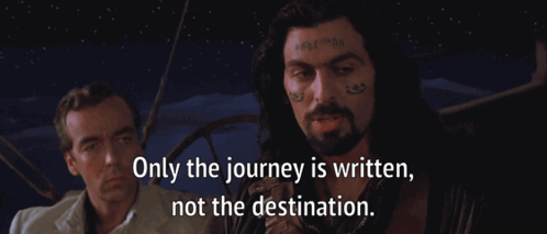 A Man With A Tattoo On His Face Is Standing Next To Another Man With The Words Only The Journey Is Written Not The Desti GIF