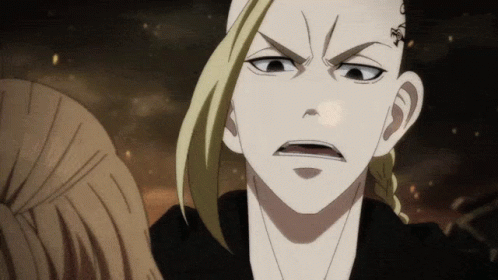 A Man With A Tattoo On His Forehead Is Making A Very Angry Face GIF