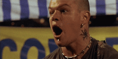 A Man With A Tattoo On His Neck Is Standing In Front Of A Sign That Says Police GIF