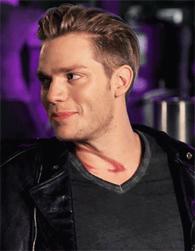 A Man With A Tattoo On His Neck Is Wearing A Black Jacket GIF