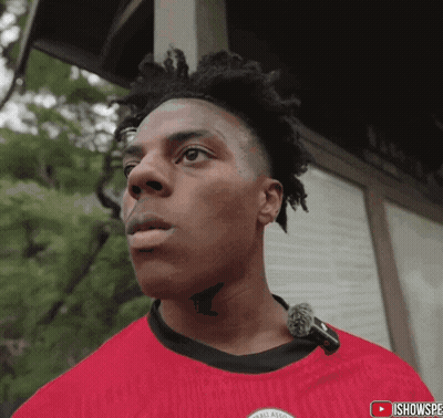 A Man With A Tattoo On His Neck Is Wearing A Red Shirt That Says All American On It GIF