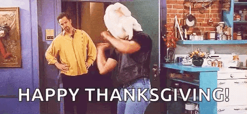 A Man With A Turkey On His Head Is Dancing In A Kitchen With Two Men . GIF