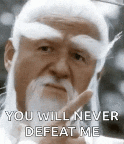 A Man With A White Beard And Mustache Is Giving The Middle Finger . GIF