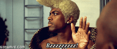 A Man With A Wig On Says Bzzzzzzz GIF
