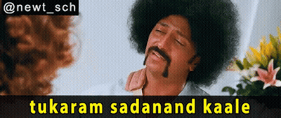 A Man With An Afro And A Mustache Is Talking To A Woman And The Caption Says Tukaram Sadanand Kaale GIF