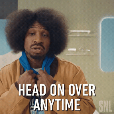 A Man With An Afro And A Scarf Around His Neck Says Head On Over Anytime Snl GIF