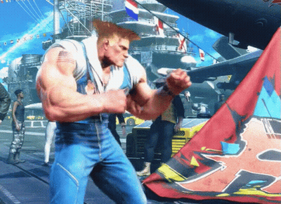 A Man With An American Flag On His Chest Is Standing In Front Of A Flag With The Letter P On It GIF