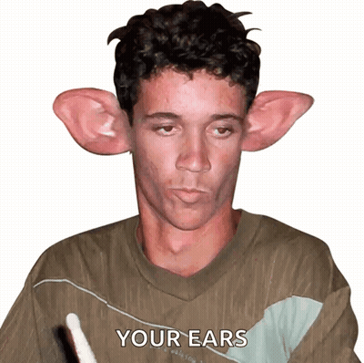 A Man With Big Ears Has The Words Your Ears Written On His Shirt GIF