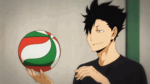 A Man With Black Hair Is Holding A Volleyball GIF
