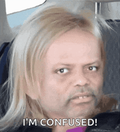 A Man With Blonde Hair And A Beard Is Sitting In A Car And Says I 'M Confused . GIF