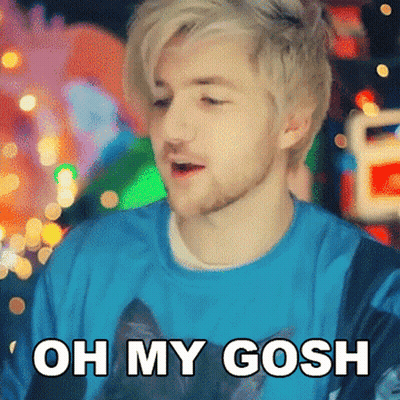 A Man With Blonde Hair And A Beard Is Wearing A Blue Shirt That Says Oh My Gosh GIF