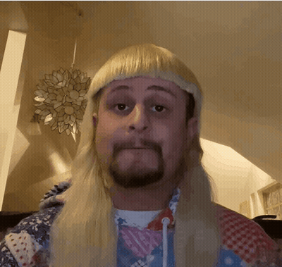 A Man With Blonde Hair And A Beard Is Wearing A Mullet GIF