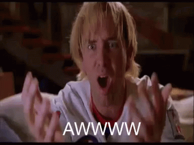 A Man With Blonde Hair And A White Shirt Is Making A Funny Face With His Mouth Open . GIF