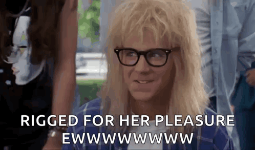A Man With Blonde Hair And Glasses Is Smiling And Saying `` Rigged For Her Pleasure Ewwwwww . '' GIF