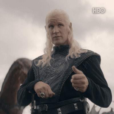 A Man With Blonde Hair Is Giving A Thumbs Up In Front Of A Cloudy Sky With Hbo Written On The Bottom GIF