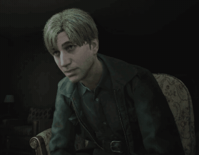 A Man With Blonde Hair Is Sitting In A Chair With His Eyes Closed GIF