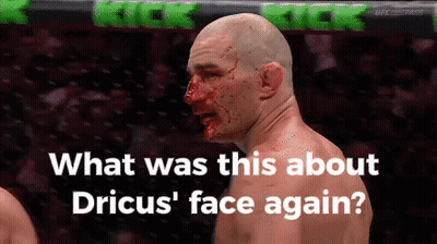 A Man With Blood On His Face And The Words " What Was This About Drius ' Face Again " GIF